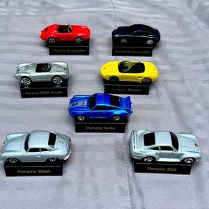 MAISTO SET OF 7 Porsche, with own labeled stands for display.